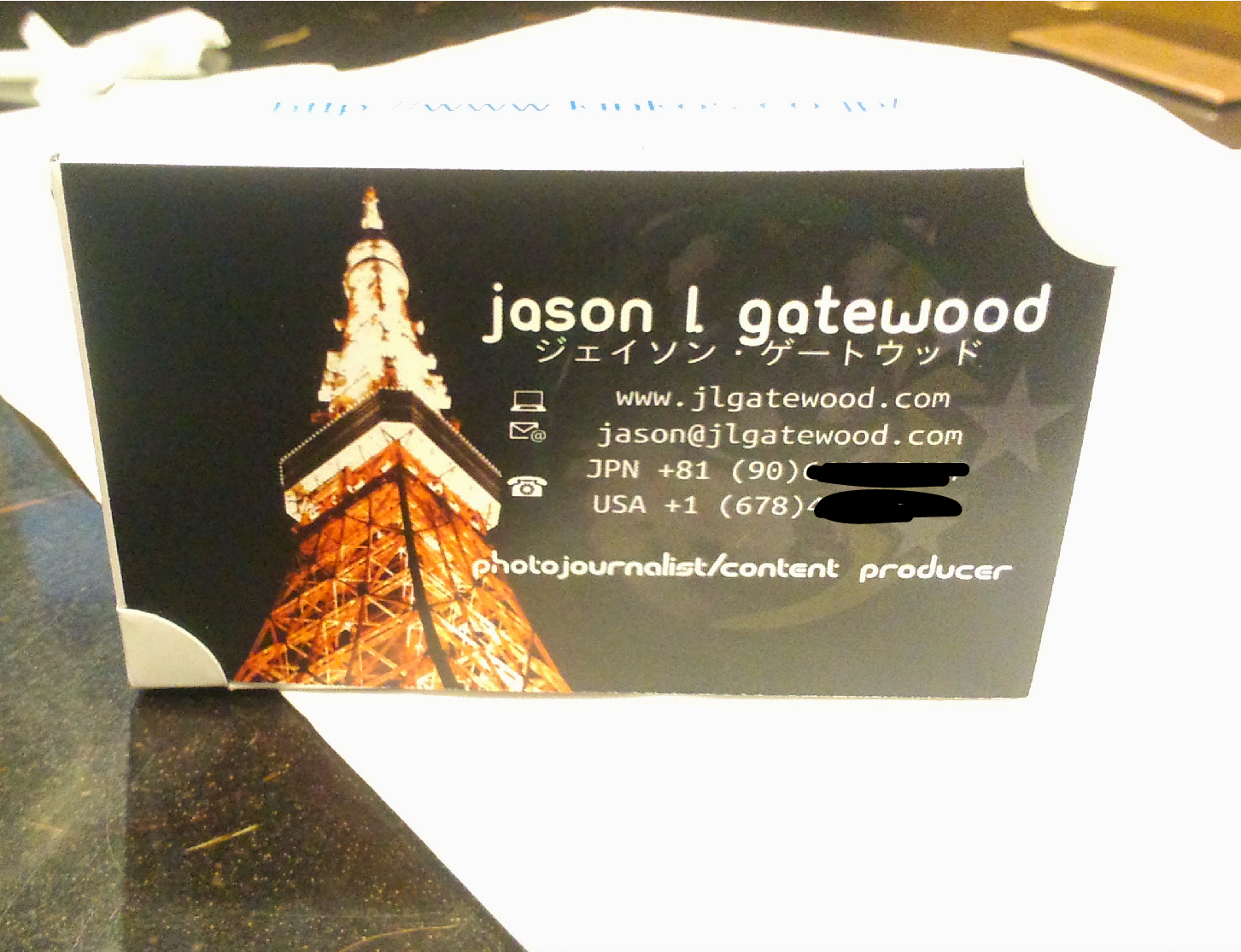 my business card in Japan with a picture of Tokyo Tower I took