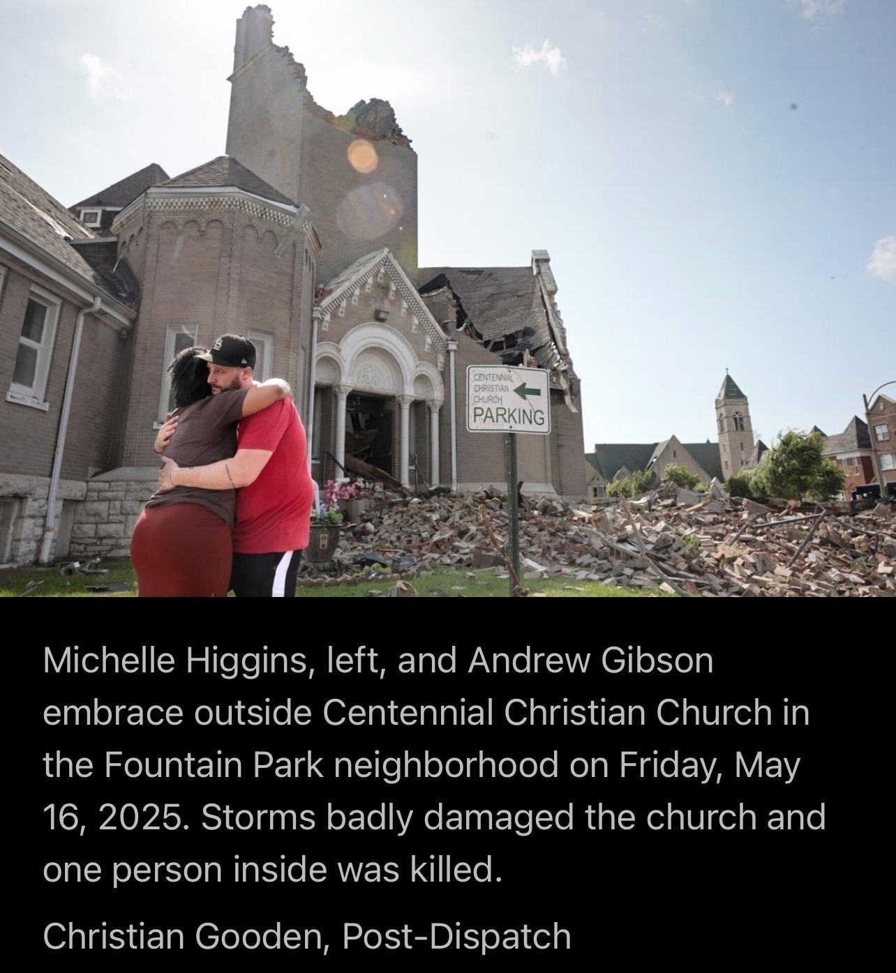 Michelle Higgins, left, and Andrew Gibson embrace outside Centennial Christian Church in the Fountain Park neighborhood on Friday, May 16, 2025. Storms badly damaged the church and one person inside was killed.